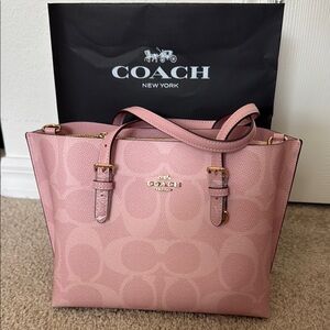 Exclusive Collection Coach Pink Tote Bag with Signature Embossed Design